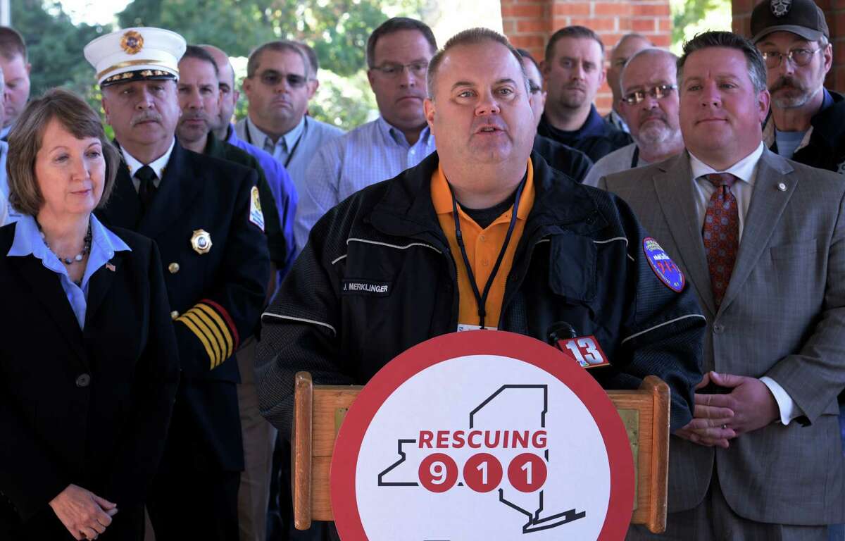 John Merklinger, director of the City of Rochester 9-1-1 call center, was joined by other advocates for dedicated resources for 9-1-1 technology upgrades at a press conference held at the Albany Marriott in Colonie, N.Y. (Skip Dickstein/Times Union)
