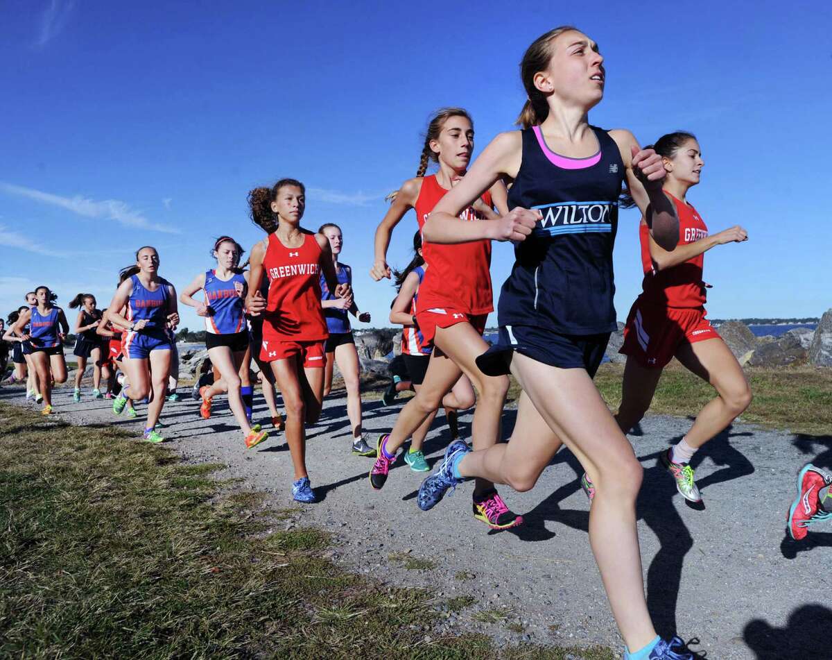 Morgan McCormick of Wilton during the girls cross country meet at Greenwich Point, Conn., Tuesday, Oct. 11, 2016. McCormick finished first in the race.