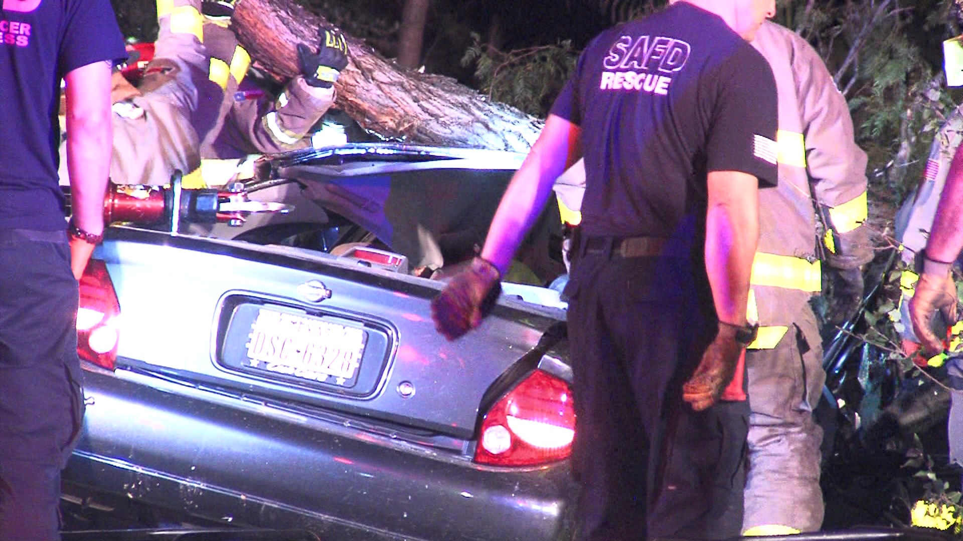 Firefighters cut roof off car, pull teen from vehicle after Northwest ...