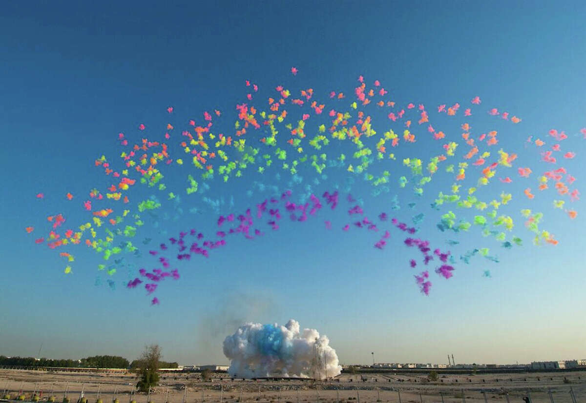 The fourth sequence of the 2011 explosion event “Black Ceremony” in Doha, Qatar, in “Sky Ladder: The Art of Cai Guo-Qiang.