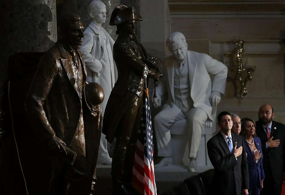 WASHINGTON, DC - SEPTEMBER 21: (L-R) Speaker of the House Paul Ryan (R-WI), Senate Majority Leader Mitch McConnell (R-KY), House Minority Leader Nancy Pelosi (D-CA) and Speaker of the House of the Ohio House of Representatives Cliff Rosenberger during the playing of the national anthem at a ceremony to dedicate a statue of Thomas Edison in Statuary Hall at the U.S. Capitol September 21, 2016 in Washington, DC. The statue of Edison was placed by in Statuary Hall by the state of Ohio, replacing the statue of former Ohio Gov. William Allen. (Photo by Win McNamee/Getty Images)