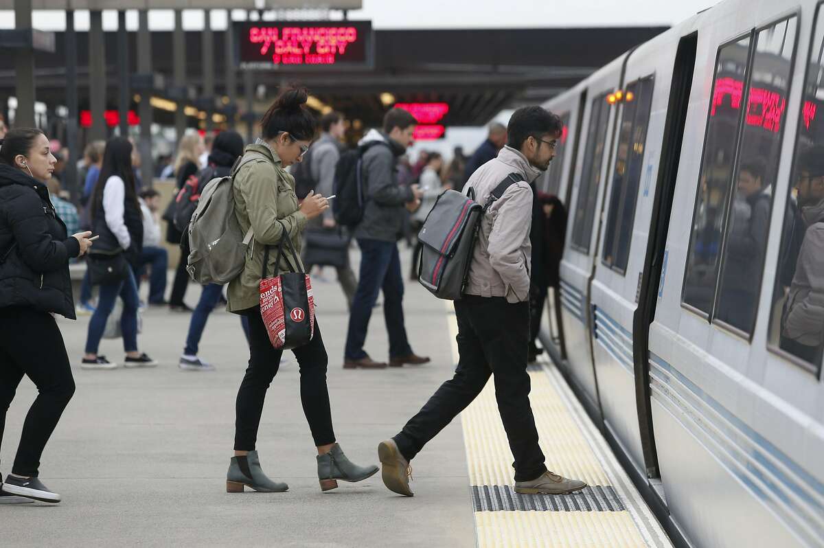 Commuters board a San Francisco-bound train at the Rockridge BART station in Oakland, Calif. on Wednesday, Oct. 12, 2016. BART officials are hoping voters will approve a $3.5 million bond measure to improve the aging infrastructure of the transit system.