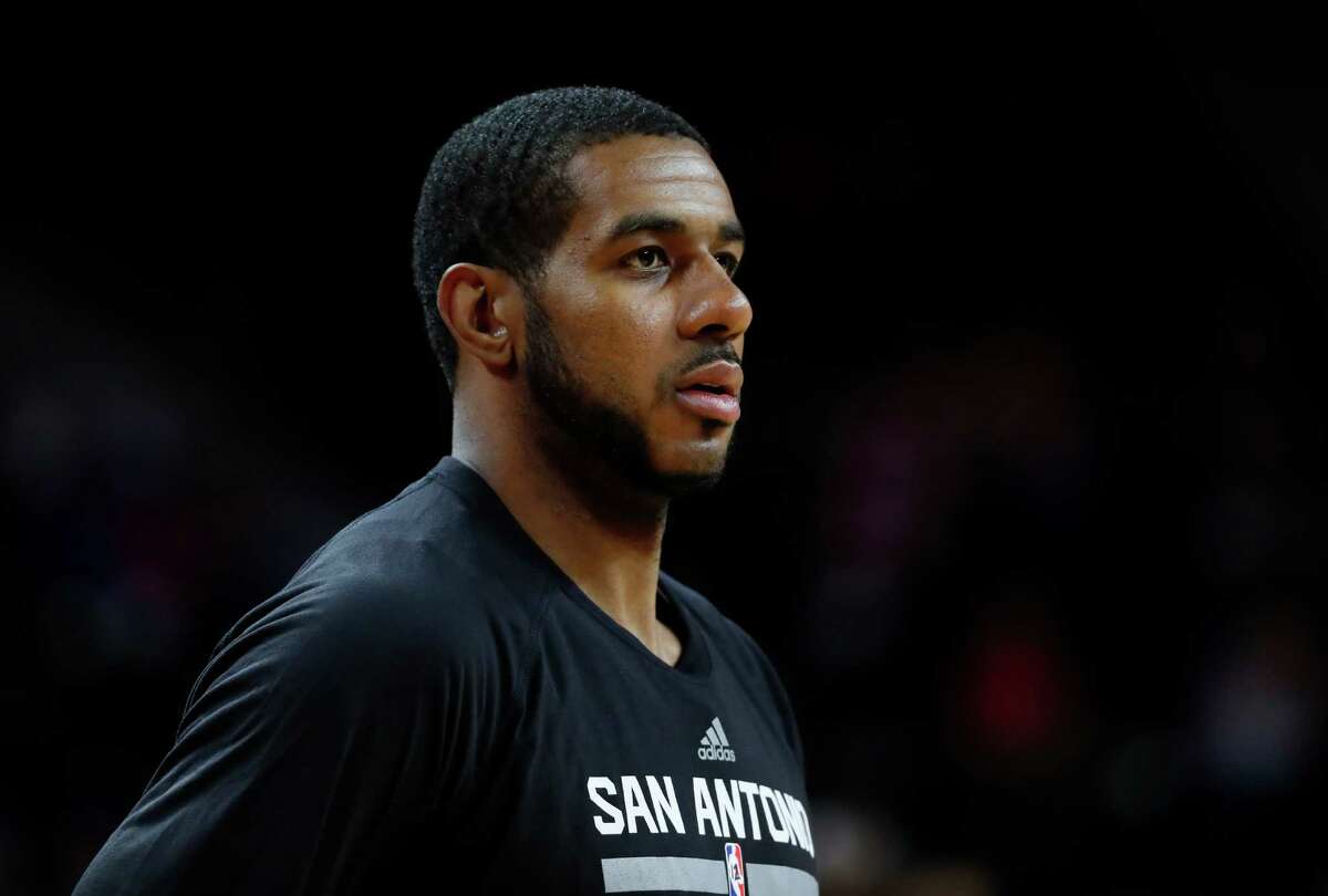 Spurs forward LaMarcus Aldridge watches before a preseason game against the Detroit Pistons in Auburn Hills, Mich., on Oct. 10, 2016. This isn't the first time trade rumors have swirled around the All Star big man.