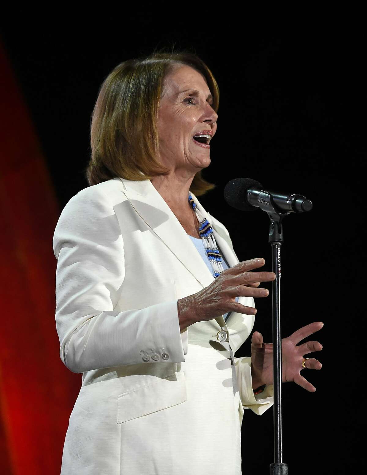 Nancy Pelosi, United States Congresswoman and Minority Leader of the United States House of Representatives speaks to the crowd at the Global Citizen Festival in New York., Saturday, Sept. 24, 2016. (AP Photo/Kathy Kmonicek)