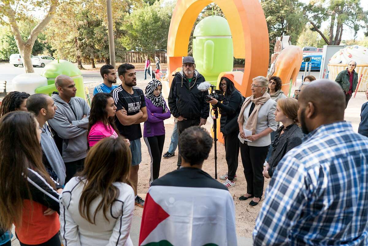 Runners gather at Google's Headquarters in Mountain View, Calif. to deliver a letter to a representative regarding the lack of recognition of 150 cities along the West Bank on Google Maps on Thursday, Oct. 13, 2016. The runners are protesting the roughly 150 cities on the West Bank that do not appear on Google or Apple maps.