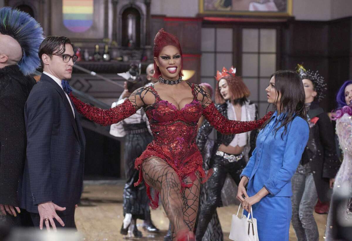 Laverne Cox (center), flanked by Ryan McCartan and Victoria Justice, plays Dr. Frank N Furter in the remake.