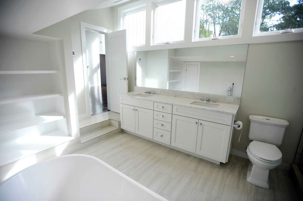 Two years after digging out, Stamford couple lists investment property