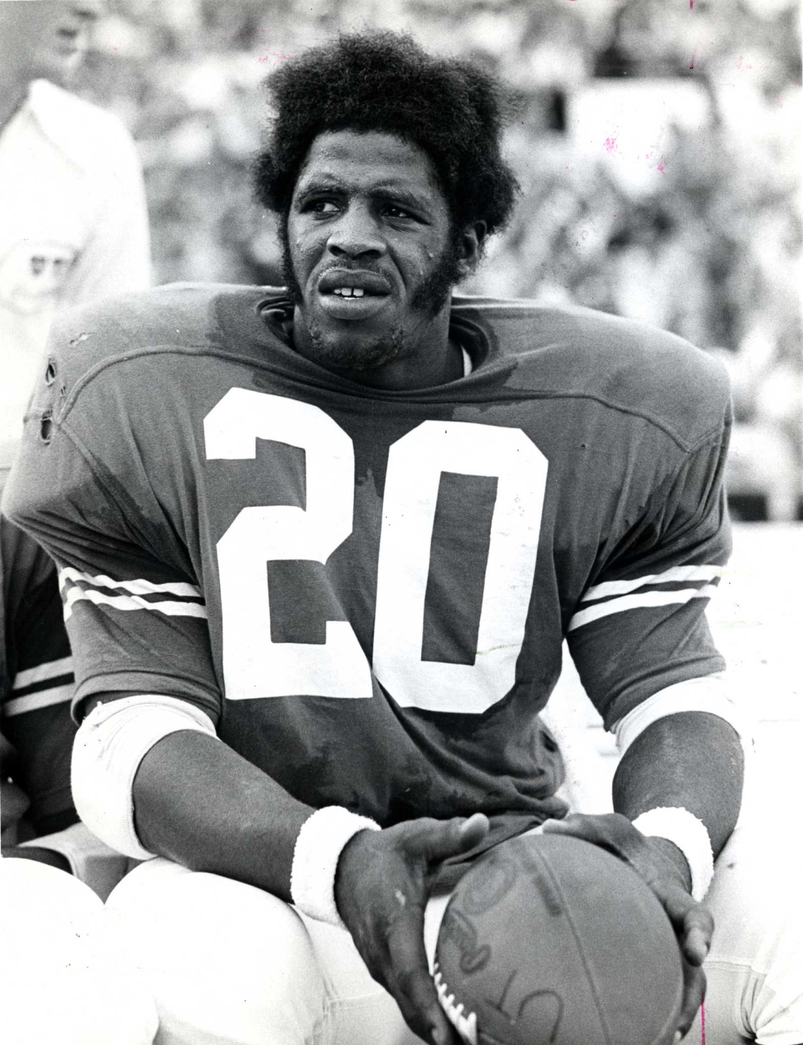 Football running back Earl Campbell poses in his Houston Oilers uniform on  Dec. 8, 1977. Campbell was the number 1 draft pick by the Houston Oilers  and was voted Rookie of the