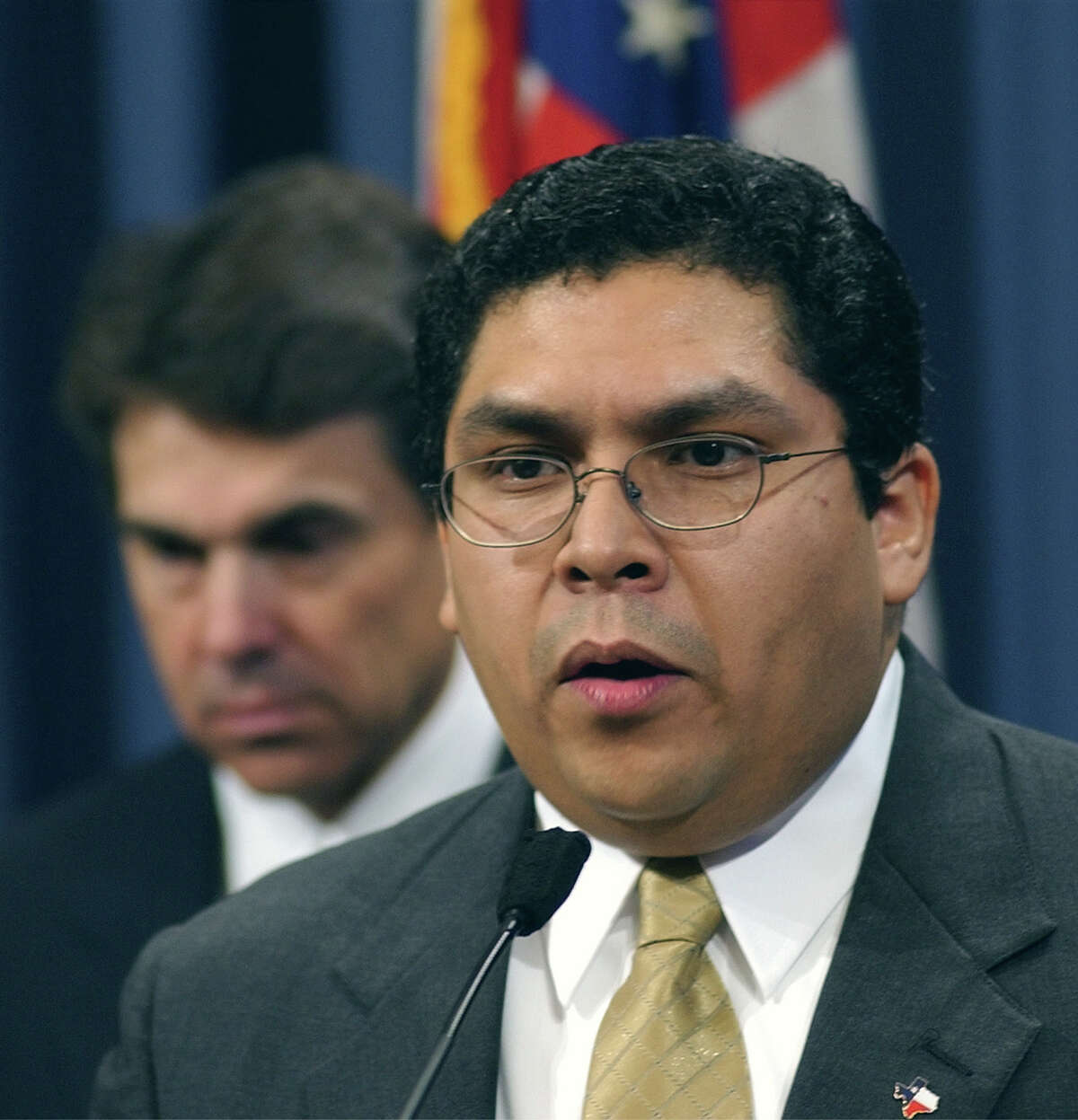 Victor Carrillo, right, speaks after being introduced by Texas Gov. Rick Perry, left, as nominee for the Railroad Commission in 2003. Carrillo has been appointed to the board of directors for Energy Hunter Resources, the Dallas-based company announced on Oct. 14, 2016. (AP File Photo/Harry Cabluck)