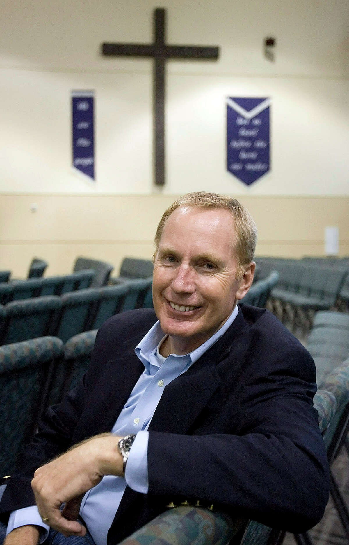 FILE - In this March 13, 2007, file photo, Oak Hills Church senior pastor Max Lucado poses in the Oak Hills Church worship center in San Antonio. As Republican presidential candidate Donald Trump?’s ascendancy forces the GOP establishment to confront how it lost touch with so many conservative voters, top evangelicals are facing their own dark night, wondering what has drawn so many Christians to a twice-divorced, profane casino magnate with a muddled record on abortion and gay marriage. "We stand against bullying in schools. Shouldn't we do the same in presidential politics?" Lucado wrote recently in Christianity Today, a prominent evangelical magazine. (William Luther/The San Antonio Express-News via AP, File) RUMBO DE SAN ANTONIO OUT; NO SALES; MANDATORY CREDIT