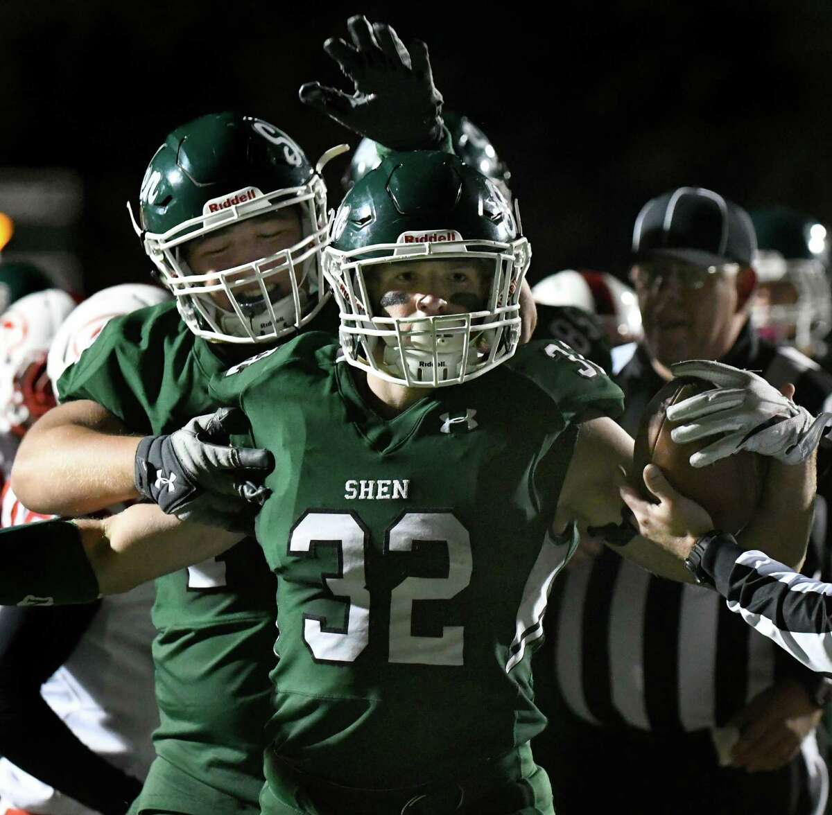 Shen's Nick Cosgrove, center, celebrates a touchdown with Ryan Collette, left, during their football game on Friday, Oct. 14, 2016, at Shenendehowa in Clifton Park, N.Y. (Cindy Schultz / Times Union)