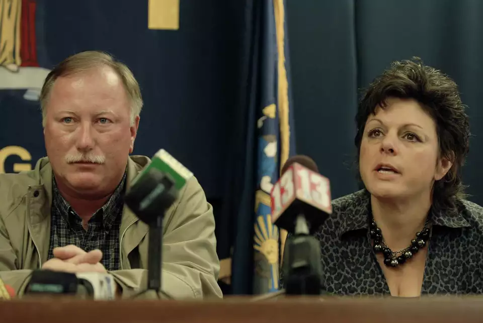 Bill and Veronica Frear seated together at a press conference about their missing son, Craig Frear.
