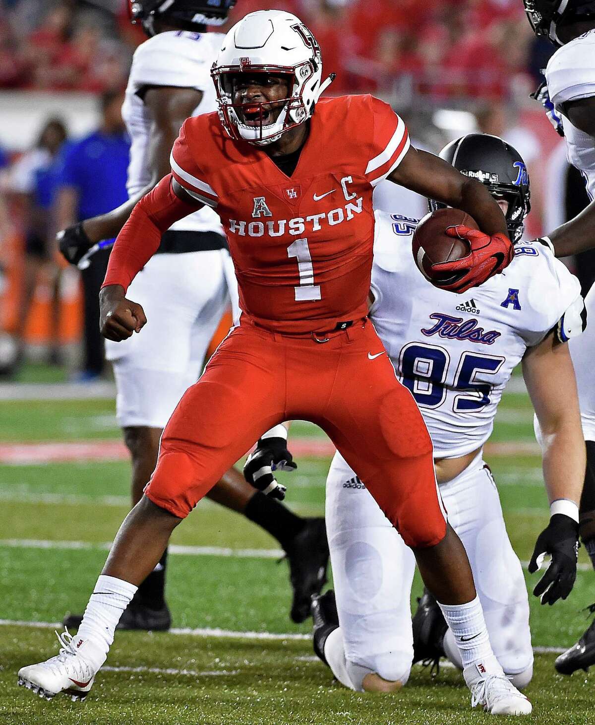 Houston quarterback Greg Ward Jr. (1) celebrates a first down in the first half of an NCAA college football game against Tulsa, Saturday, Oct. 15, 2016, in Houston. (AP Photo/Eric Christian Smith)