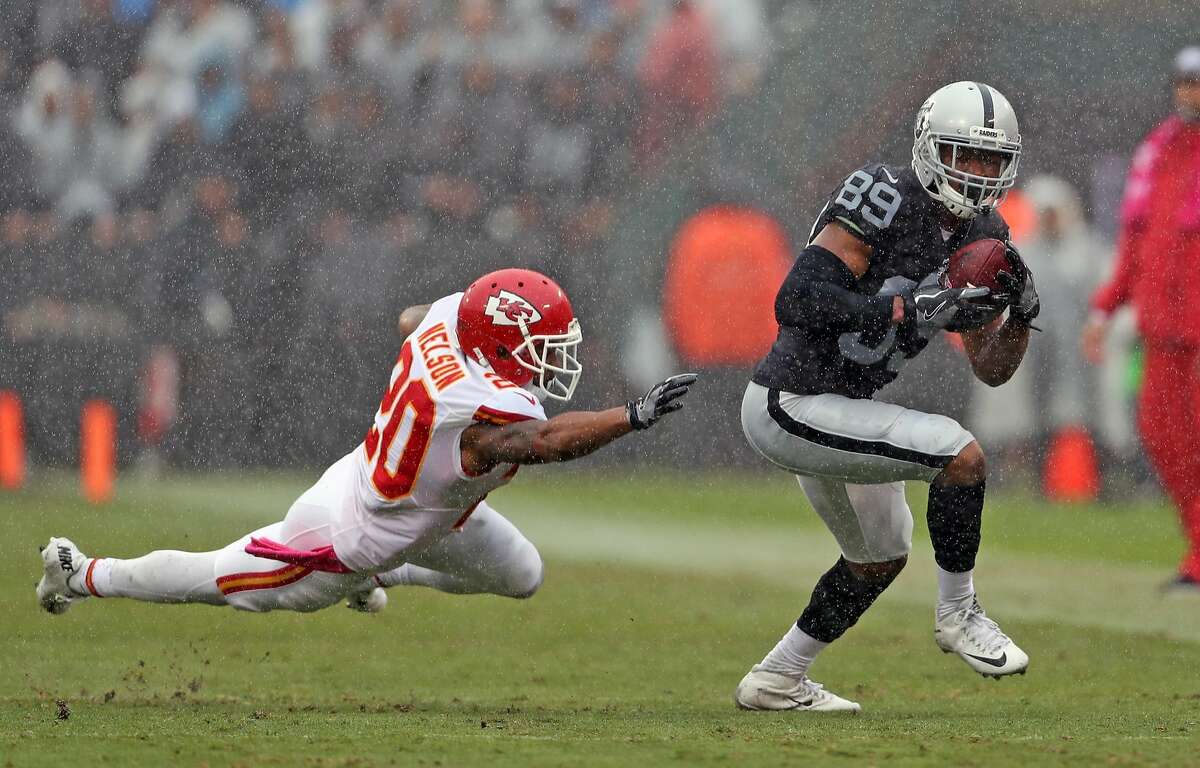 Oakland Raiders' Amari Cooper runs after a catch against the