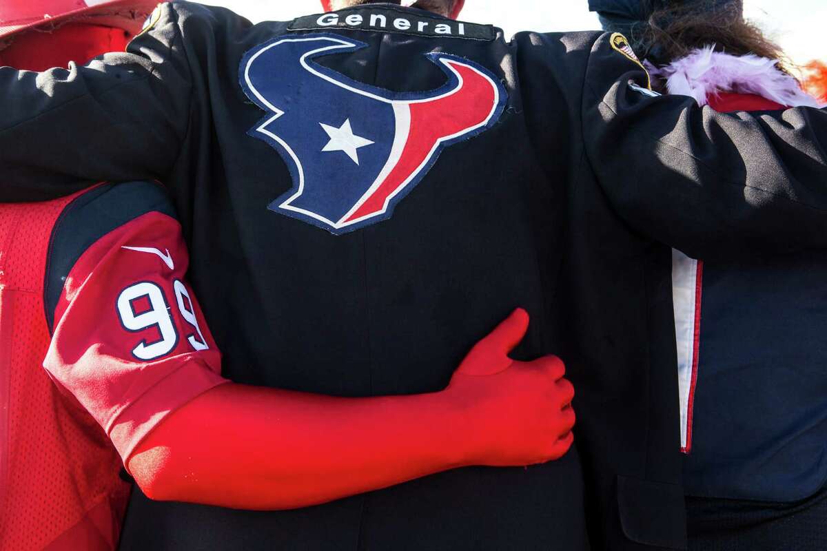 Fans tailgate prior to an NFL football game between the Houston
