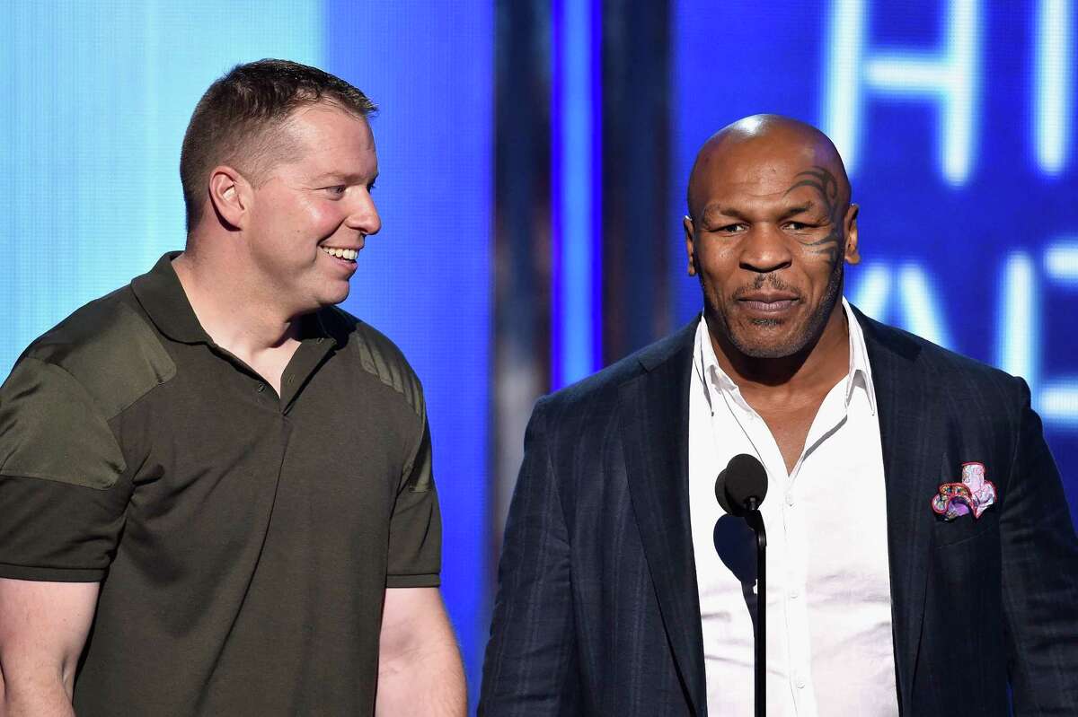 Comedian Gary Owen and former boxer Mike Tyson attend the 2014 BET Awards.