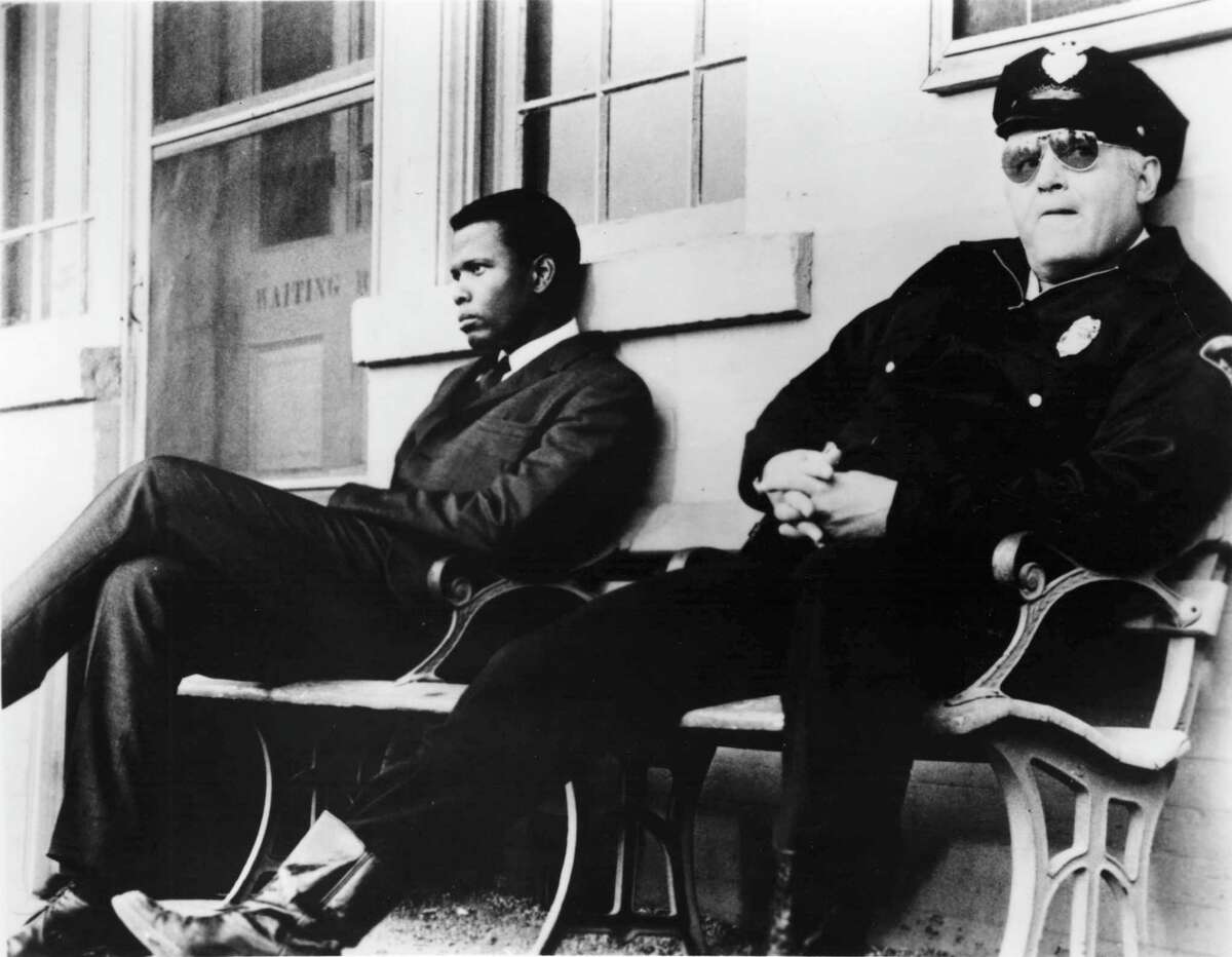 Actors Sidney Poitier and Rod Steiger appear in a scene from the 1967 movie "In the Heat of the Night."