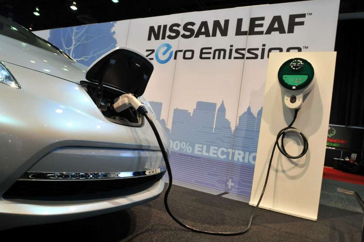 DETROIT - JANUARY 12: The Nissan Leaf prototype electric car on display during the press preview for the world automotive media North American International Auto Show at the Cobo Center January 12, 2010 in Detroit, Michigan. The 2010 North American International Auto Show (NAIAS) opens to the public January 16th. (Photo by Bryan Mitchell/Getty Images)