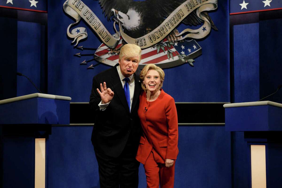 FILE - In a Saturday, Oct. 1, 2016 file photo provided by NBC, Alec Baldwin, left, as Republican presidential candidate, Donald Trump, and Kate McKinnon, as Democratic presidential candidate, Hillary Clinton, perform on the 42nd season of "Saturday Night Live," in New York. Republican presidential candidate Donald Trump tweeted early Sunday morning, Oct. 16, 2016, that the show’s skit depicting him this week was a “hit job.” Trump went on to write that it’s “time to retire” the show, calling it “boring and unfunny” and adding that Alec Baldwin’s portrayal of him “stinks.” (Will Heath/NBC via AP, File)