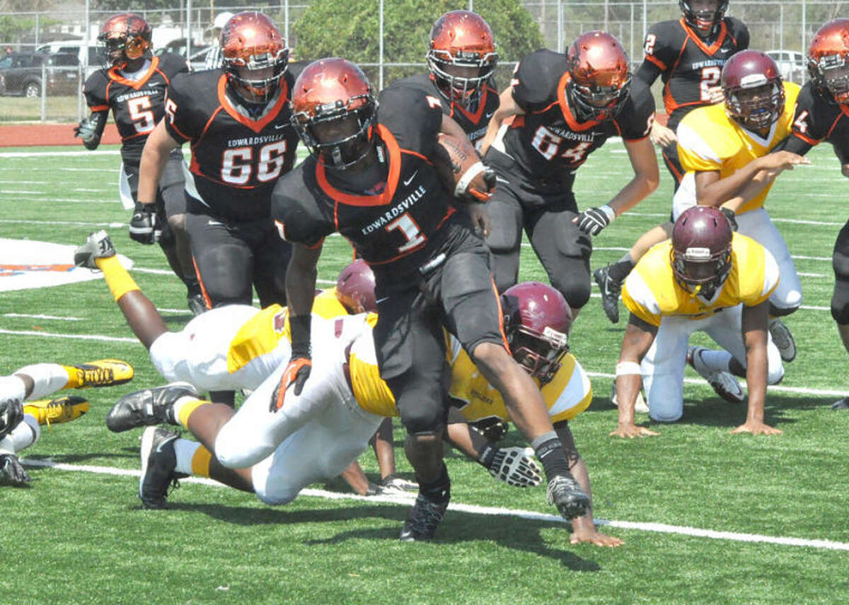 Edwardsville’s Craig James breaks away from a Soldan defender during his senior season with the Tigers. James led the signing class for EHS on Wednesday, announcing he would continue his football career at the University of Minnesota.  