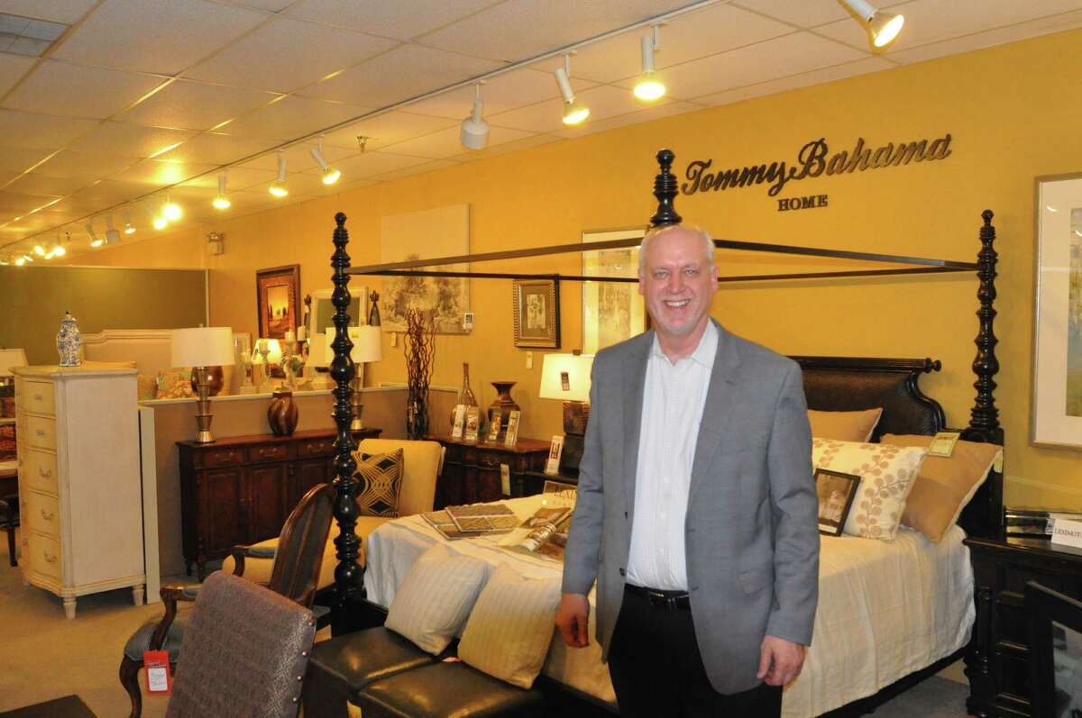Chris Pfeiffer stands in the showroom of his retail store, Homestead House, in Conroe, Texas on Monday, Oct. 17, 2016. Pfeiffer says he has customers who visit his store and learn about high-end furniture from his staff before ordering the same goods from Internet retailers to avoid paying Texas' 8.25 percent sales tax. He wants lawmakers to pass legislation that would prevent such tax evasion.