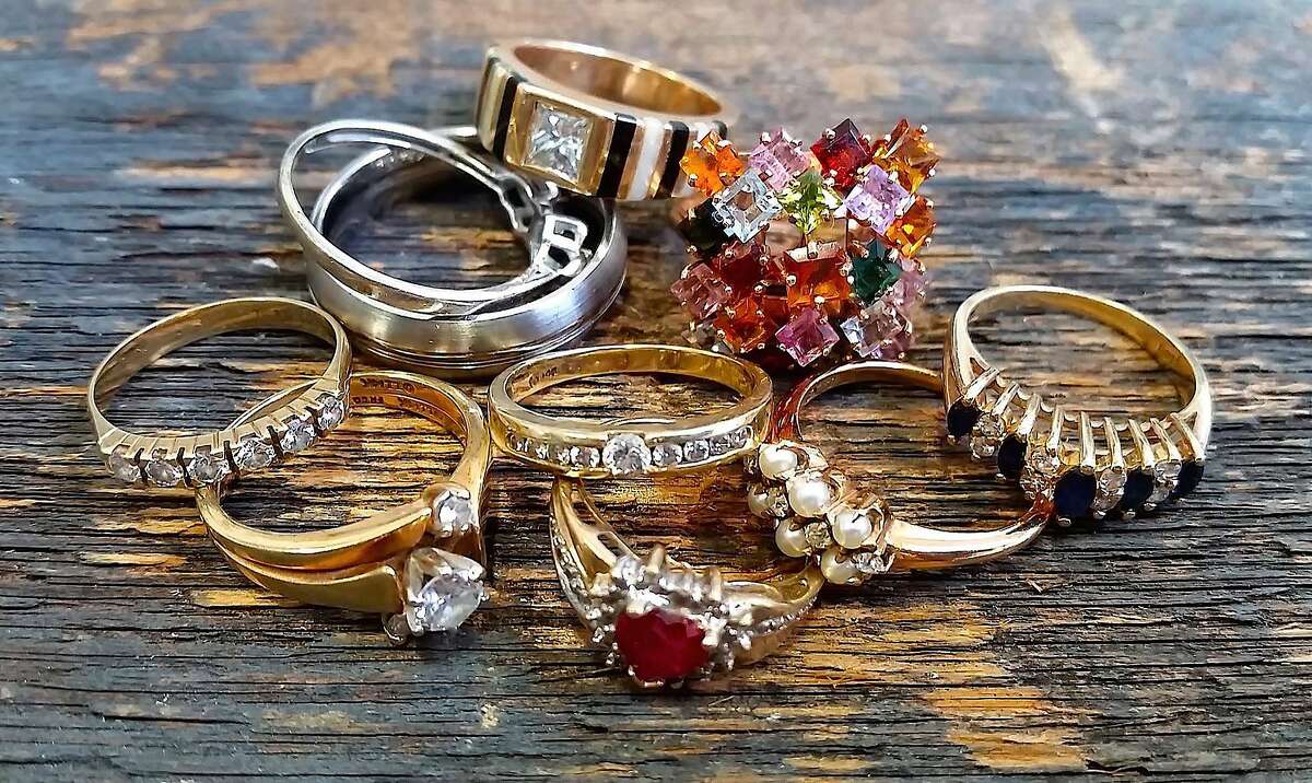 Donated rings, including Marirose Piciucco's engagement ring and wedding band is on the bottom left.