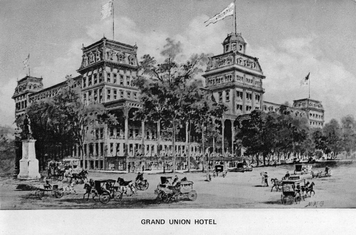 Saratoga Springs Grand Union Hotel Post Card. Photo hand-colored by George S. Bolster in 1975. "Grand Union Hotel 1870 - One this site in 1802 was erected Gideon Putnam's Tavern - later known as Union Hall. Remodeled into a brick structure, it contained 824 rooms - boasted of 1 mile of piazzas, 2 miles of hallways and 12 acres of carpet. At the time, it was considered the largest hotel in the world." (Times Union Archive)