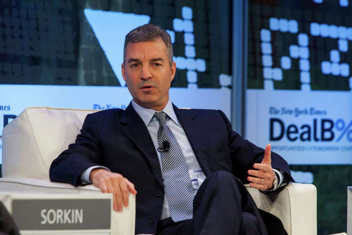 FILE ?— Daniel Loeb, the hedge fund billionaire, speaks at a conference in New York, Nov. 12, 2013. The very richest Americans have quietly shaped tax policy so as to shield millions, if not billions, of their income; Loeb invests in a Bermuda-based reinsurer that then invests that money in his hedge fund, transforming profits into capital gains taxed at roughly half the rate. (Michael Nagle/The New York Times) ORG XMIT: XNYT53