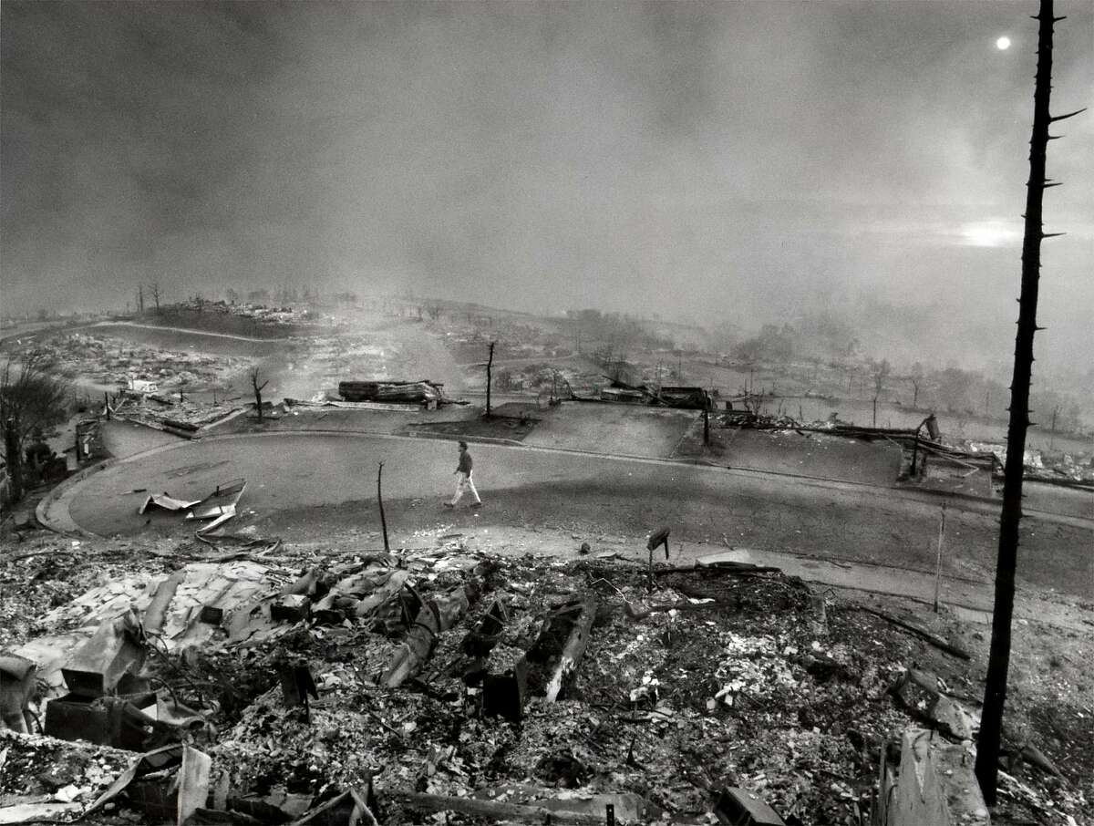 Devastation on Kent Road after the Oakland hills fire of October 1991; view is toward the bay from the Oakland hills.