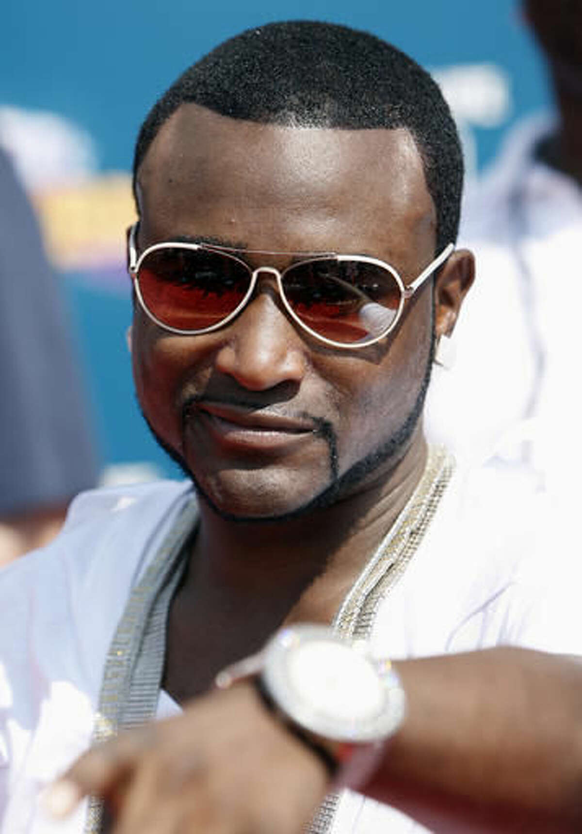 FILE- In this June 24, 2008 file photo, Shawty Lo arrives at the BET Awards in Los Angeles. Authorities say rapper Shawty Lo, whose real name is Carlos Walker, has been killed in a fiery car crash before dawn Wednesday, Sept. 21, 2016 on a freeway near southwest Atlanta. (AP Photo/Matt Sayles, File)
