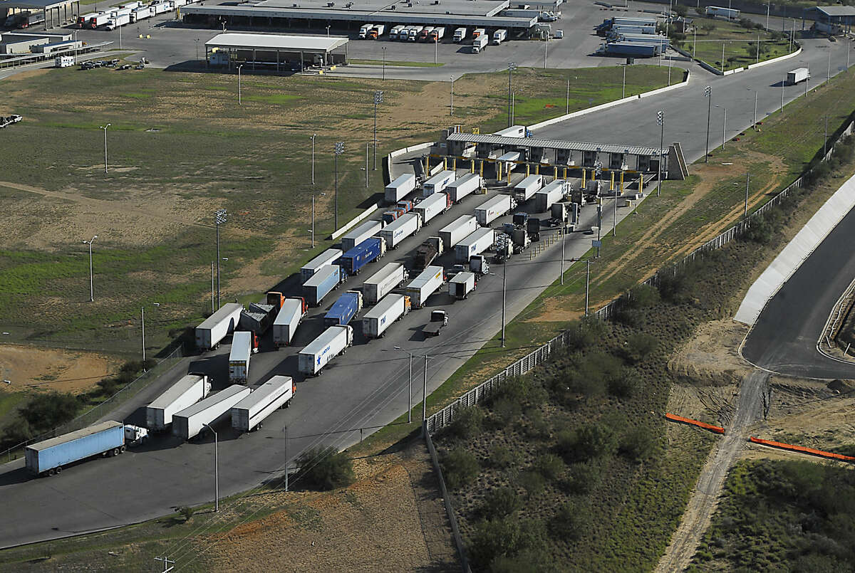 Commercial vehicles line up at the import lot of the World Trade International Bridge in this Oct. 17, 2009 file photo. (Photo by Laredo Morning Times)