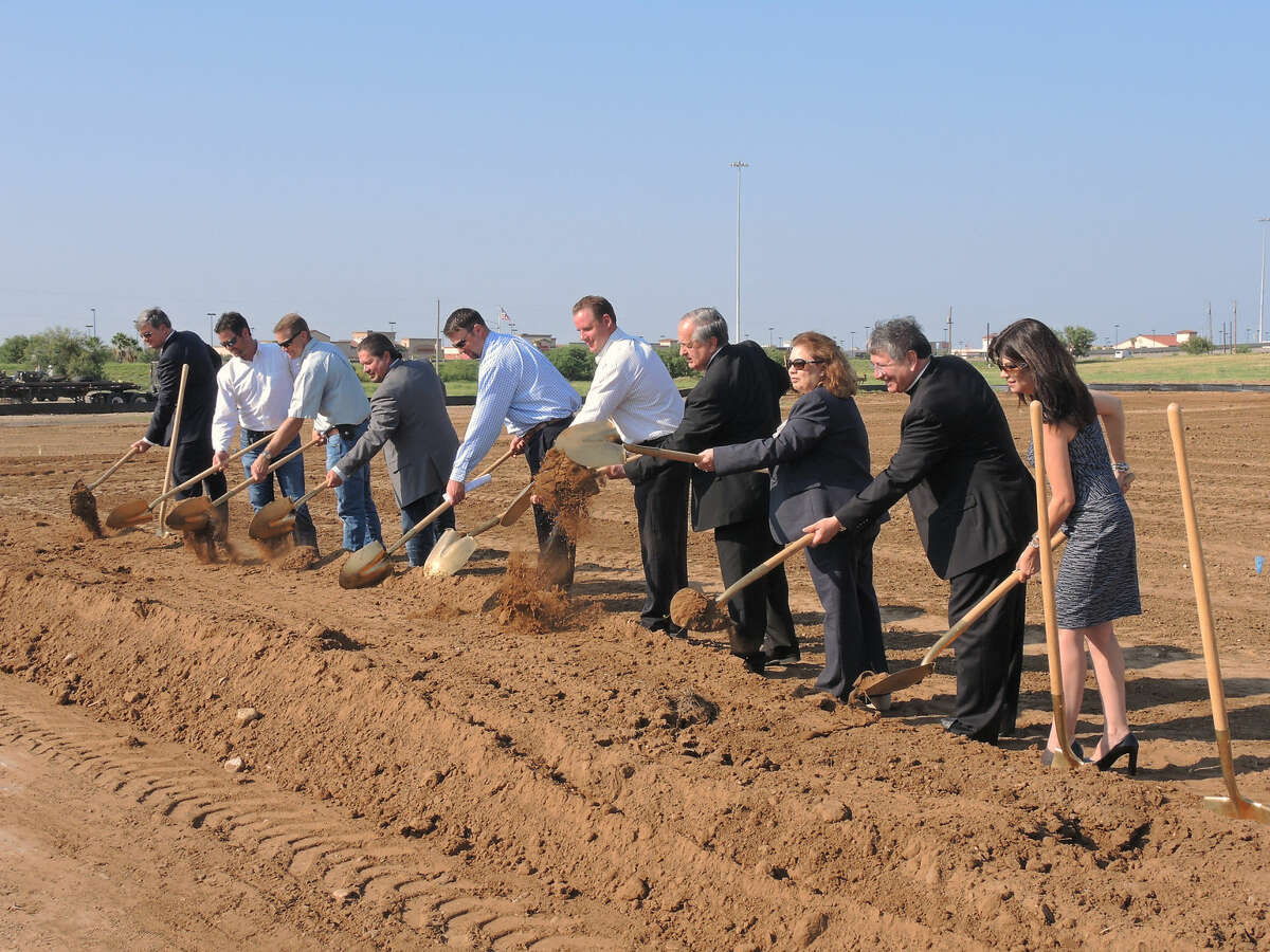 In this August 2014 file photo, owners of the Alamo Drafthouse Cinema were joined by Bishop James Tamayo, Laredo Development Foundation Executive Director Olivia Varela and city and county officials as they break ground on the new theater.