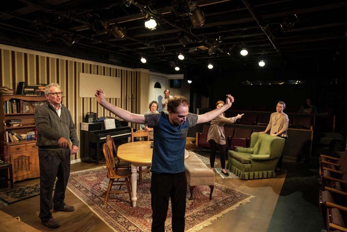 Mark McCarver (center) stars in "Tribes" in the Cellar Theater of The Playhouse San Antonio.