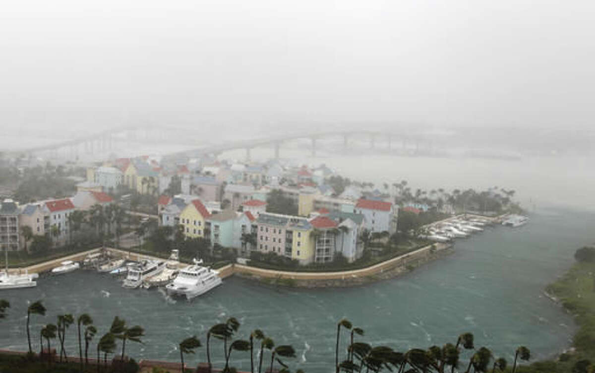 Hurricane Matthew moves through Paradise Island in Nassau, Bahamas, Thursday, Oct. 6, 2016. The head of the Bahamas National Emergency Management Authority, Capt. Stephen Russell, said there were many downed trees and power lines, but no reports of casualties. (AP Photo/Tim Aylen)