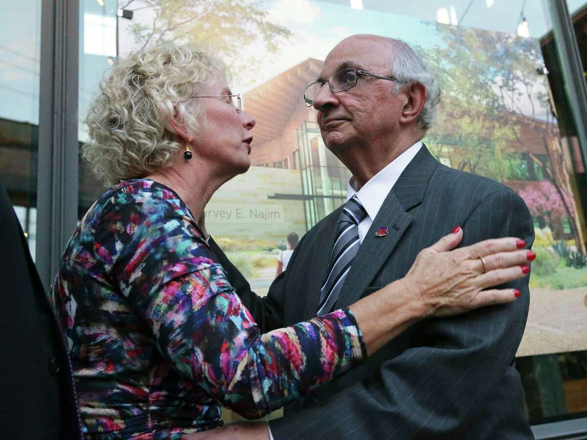Philanthropist Harvey E. Najim and Childsafe President and CEO Kim Abernethy embrace for a moment in this 2016 file photo. The two have led the way in building ChildSafe’s immaculate new campus on the East Side.
