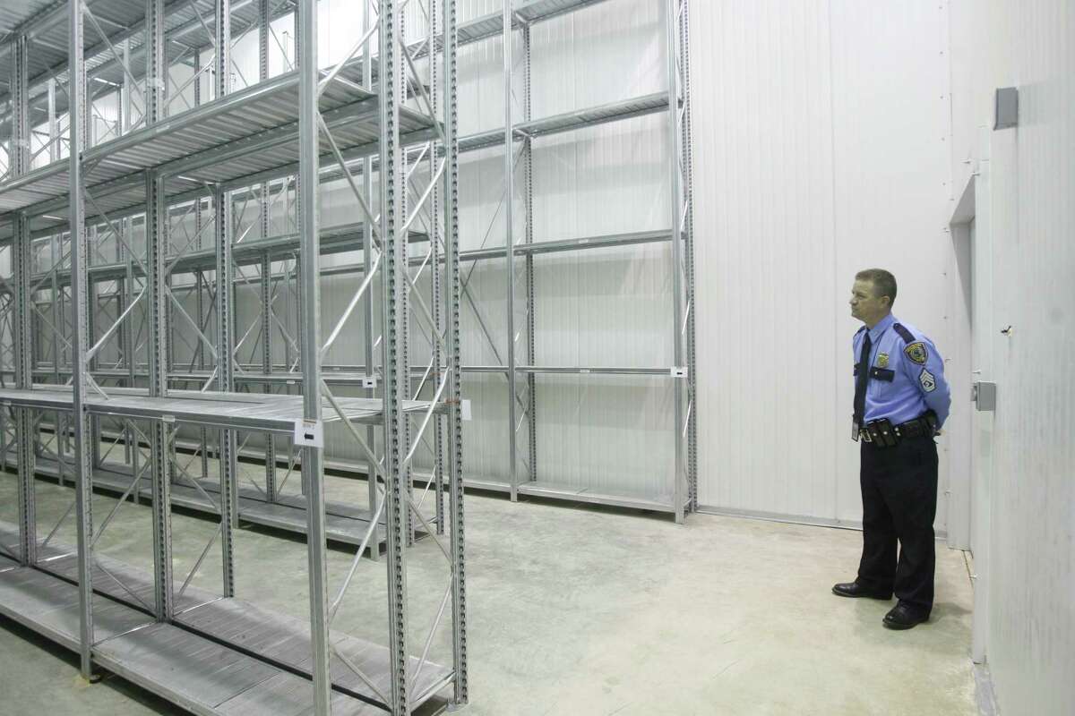 HPD Sergeant Joe McGee stands in an Evidence Storage Room that is a large freezer that will keep certain evidence (bodily fluids) in the right temperature for analysis in the then-new Houston Police Department Property Room on Thursday, June 18, 2009.