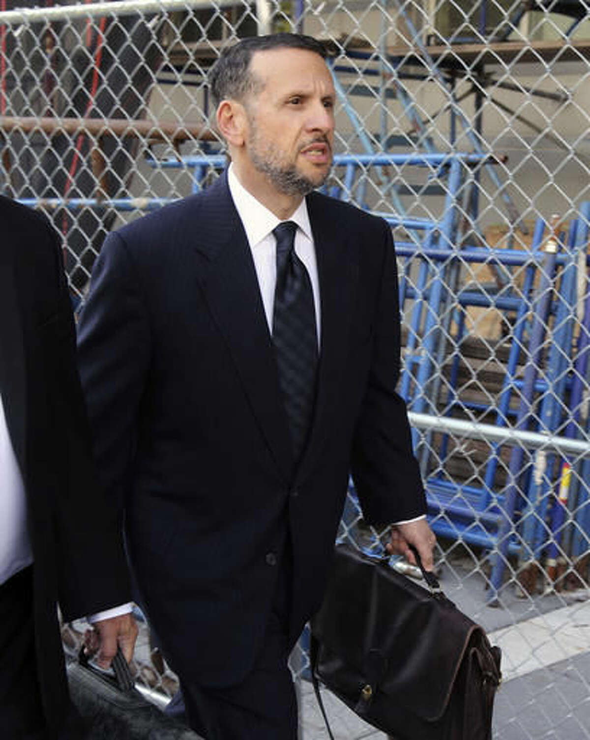 FILE - In a Friday, Sept. 23, 2016 file photo, David Wildstein arrives at the federal courthouse, in Newark, N.J. Wildstein testified Tuesday, Oct. 4, 2016, that New Jersey Gov. Chris Christie and New York Gov. Andrew Cuomo discussed releasing a false report to tamp down questions over the George Washington Bridge lane-closure scandal. (Chris Pedota/The Record via AP, File)