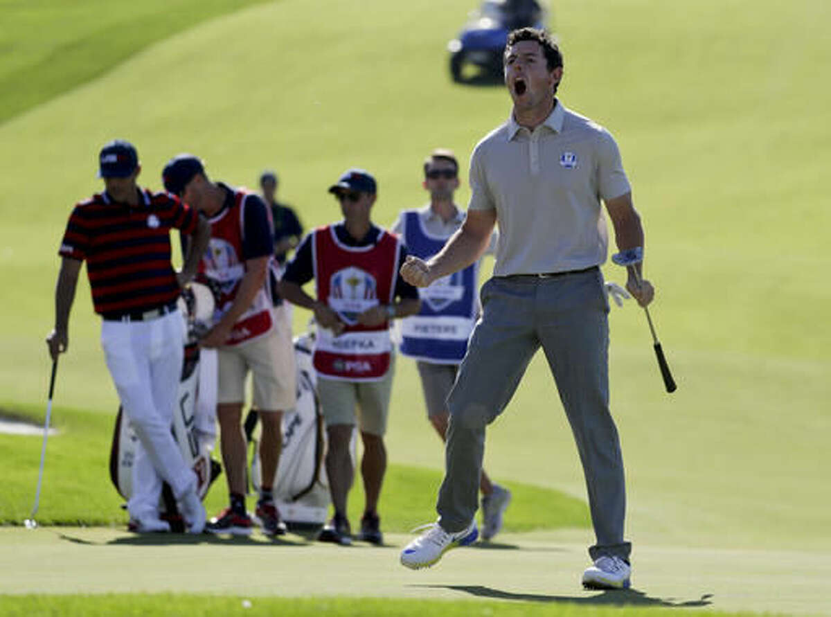 Europe’s Rory McIlroy celebrates after putting on the 10th hole during a four-ball match at the Ryder Cup golf tournament Saturday, Oct. 1, 2016, at Hazeltine National Golf Club in Chaska, Minn. (AP Photo/Chris Carlson)