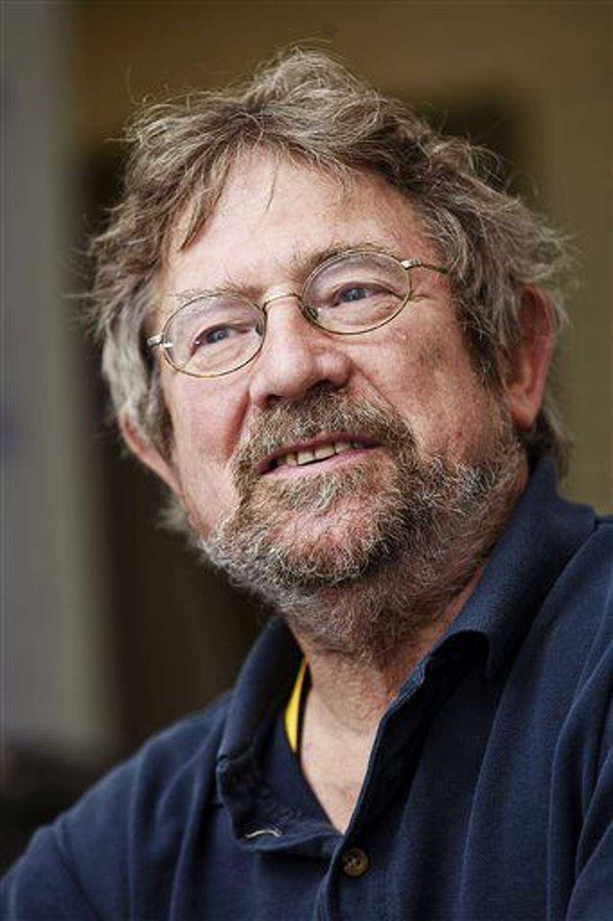 John Michael Kosterlitz, one of the scientists that has been awarded the Nobel Prize in physics, poses for a photo at Aalto University in Espoo, Finland, Tuesday Oct. 4, 2016. The Royal Swedish Academy of Sciences has cited David Thouless, Duncan Haldane and Michael Kosterlitz for "theoretical discoveries of topological phase transitions and topological phases of matter." (Roni Rekomaa/Lehtikuva via AP)