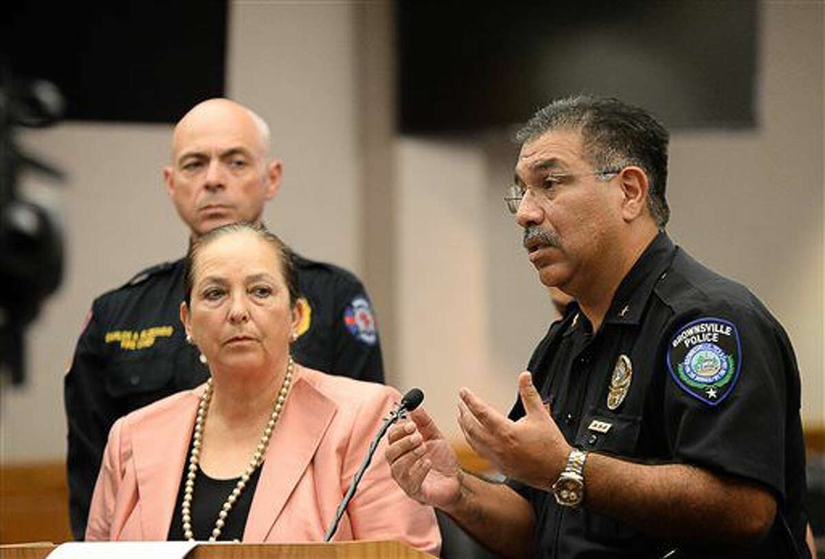Police chief Orlando Rodriguez addresses the media, Tuesday, Oct. 4, 2016, in Brownsville, Texas. The local school district and city officials spoke to the media regarding recent threat-like hoaxes directed at area schools resulting in one student's arrest and a pending investigation. (Jason Hoekema/The Brownsville Herald via AP)
