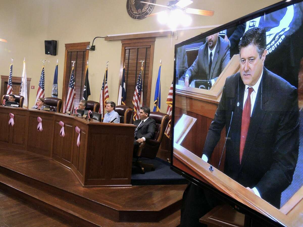 State Rep. Richard Raymond makes a presentation during a special meeting in the Webb County Commissioners Court. The meeting was held Oct. 29 to address the transition of health and environmental services previously provided by the City of Laredo Health Department. (File photo by Cuate Santos/Laredo Morning Times)