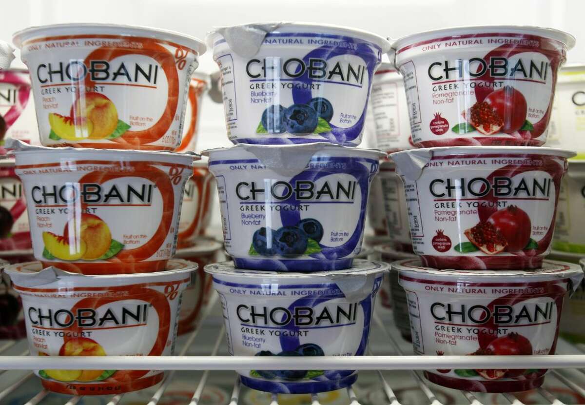 In this Jan. 13, 2012, file photo, Chobani Greek Yogurt is seen at the Chobani plant in South Edmeston, N.Y. Chobani says it's issuing a recall of some of its Greek yogurt cups that were affected by mold, according to the company, Thursday, Sept. 5, 2013. The recall comes after some customers reported claims of illnesses. (AP Photo/Mike Groll, File)