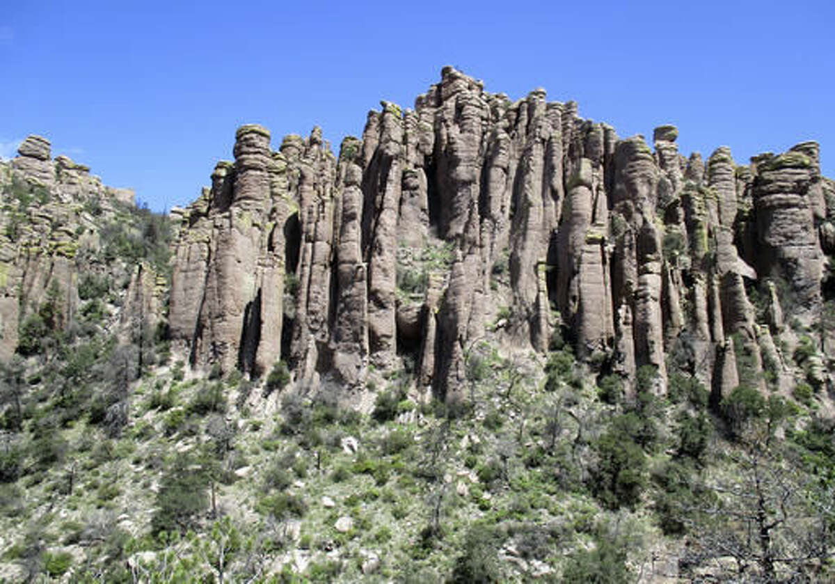 In this 2015 photo provided by Bob Gent shows, rare geological formations in Chiricahua National Monument in southern Ariz. A group of local leaders is advocating for the monument to be re-designated as a national park, which they say would bring more prestige and more tourism to the 92-year-old monument. The monument is 115 miles southeast of Tucson, Ariz. (Bob Gent via AP)