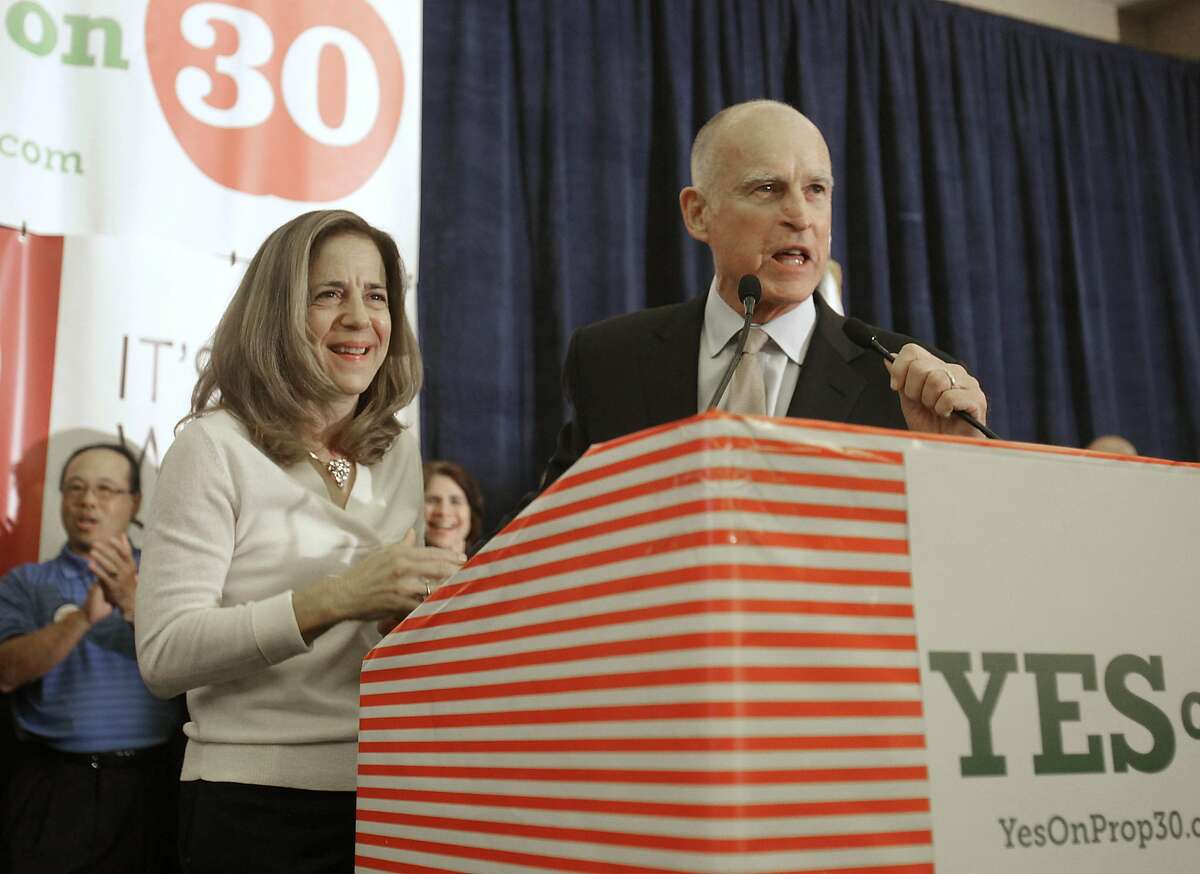 Gov. Jerry Brown and his wife, Anne Gust Brown, thank supporters for their work on his temporary tax hike initiative, Proposition 30, during an election night party in Sacramento. Now, with the sales tax set to expire at the end of this year and income taxes on those who make more than $250,000 a year in 2019, the California Teachers Association and other labor unions want to keep the income taxes on the wealthy, which they say are again needed to ?“prevent $4 billion in cuts?” to schools. 
