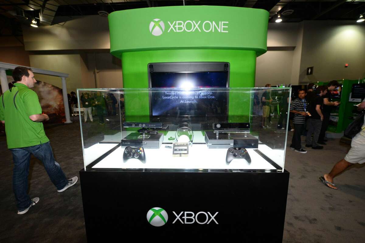 This Aug. 28, 2013 file photo shows a Microsoft Xbox One console at GameStop Expo, in Las Vegas. During a presentation at the GameStop Expo to promote the upcoming Xbox One console last week, a no-frills approach is exactly what Microsoft employed when confronted with a convention room full of passionate gamers. There were no flashy videos, sensational demonstrations or celebrity appearances. (Photo by Al Powers/Invision/AP, File)