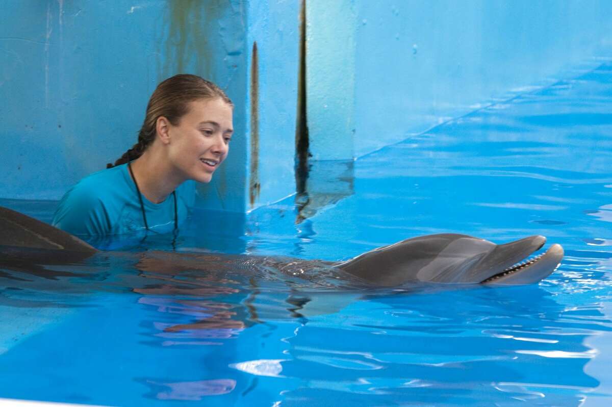 Austin Highsmith is seen here in the role of Phoebe in “Dolphin Tale." “Dolphin Tale" dethroned "The Lion King" in the weekend box office. The "Dolphin Tale" held up well with $14.2 million in its second weekend. (AP Photo/Jon Farmer, Alcon Entertainment)