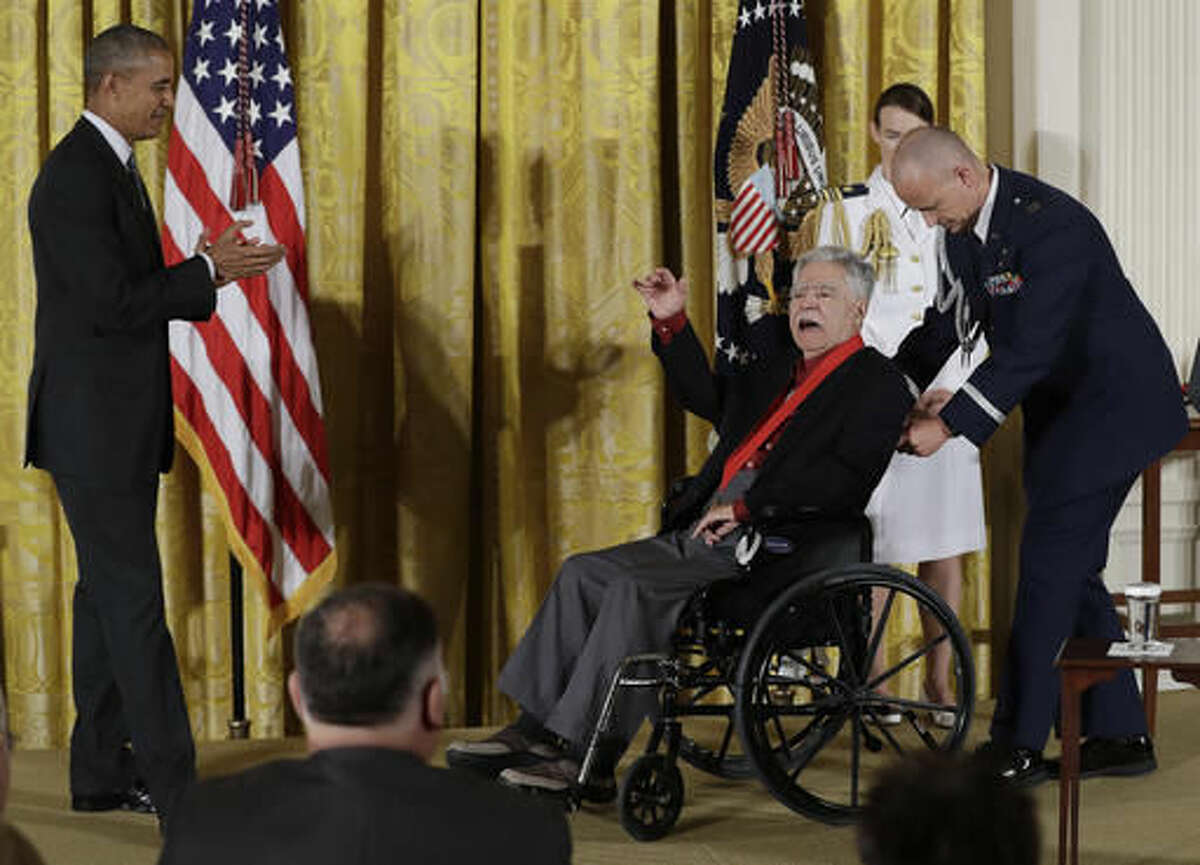 President Barack Obama looks to author Rudolfo Anaya as he calls out after being awarded the 2015 National Humanities Medal during a ceremony in the East Room of the White House, Thursday, Sept. 22, 2016, in Washington. (AP Photo/Carolyn Kaster)