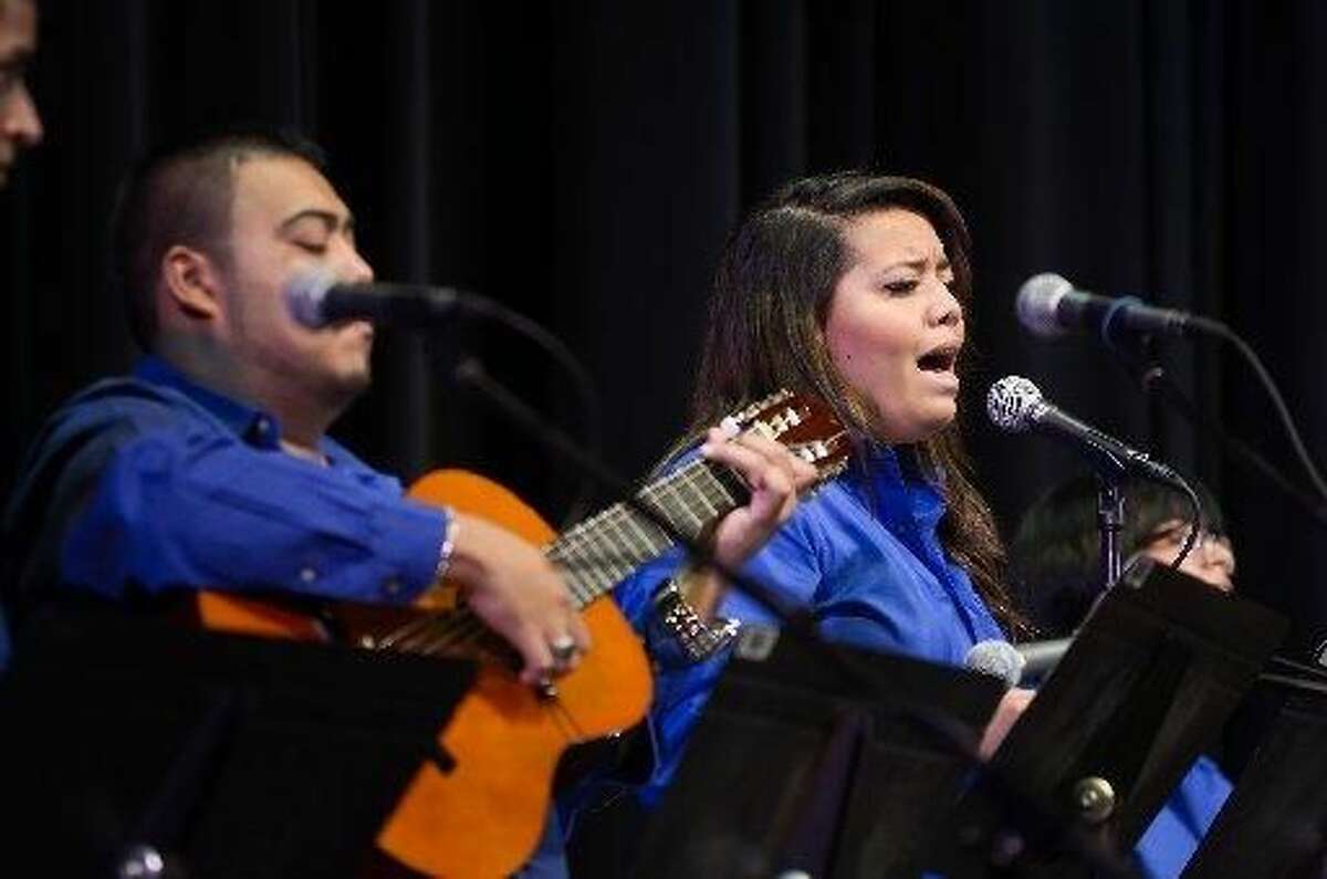 Felipe Suarez and Melissa Vallejo and the rest of the Laredo Community College Spanish Traditional Group perform the classic spanish ballad "Amor Eterno" for an audience of mothers and their families on Sunday afternoon at the Laredo Community College Guadalupe and Lilia Martinez Fine Arts Center theater. (Photo by Danny Zaragoza