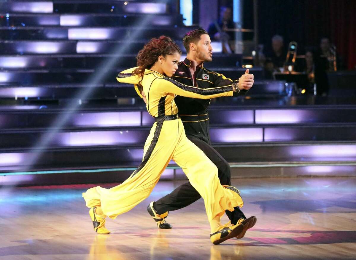 This May 13, 2013 photo released by ABC shows actress Zendaya Coleman and her partner Val Chmerkovskiy performing on the celebrity dance competition series "Dancing with the Stars," in Los Angeles. Zendaya is one of four celebrities competing in the finals Monday, May 20. A winner will be announced on Tuesday. (AP Photo/ABC, Adam Taylor)