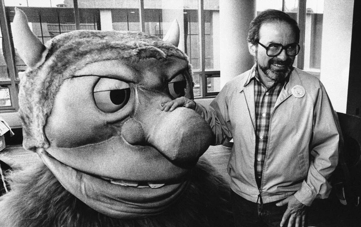 In this Sept. 25, 1985 file photo, author Maurice Sendak poses with one of the characters from his book "Where the Wild Things Are," designed for the operatic adaptation of his book in St. Paul, Minn. Sendak died, Tuesday, May 8, 2012 at Danbury Hospital in Danbury, Conn. He was 83. (AP Photo, file)